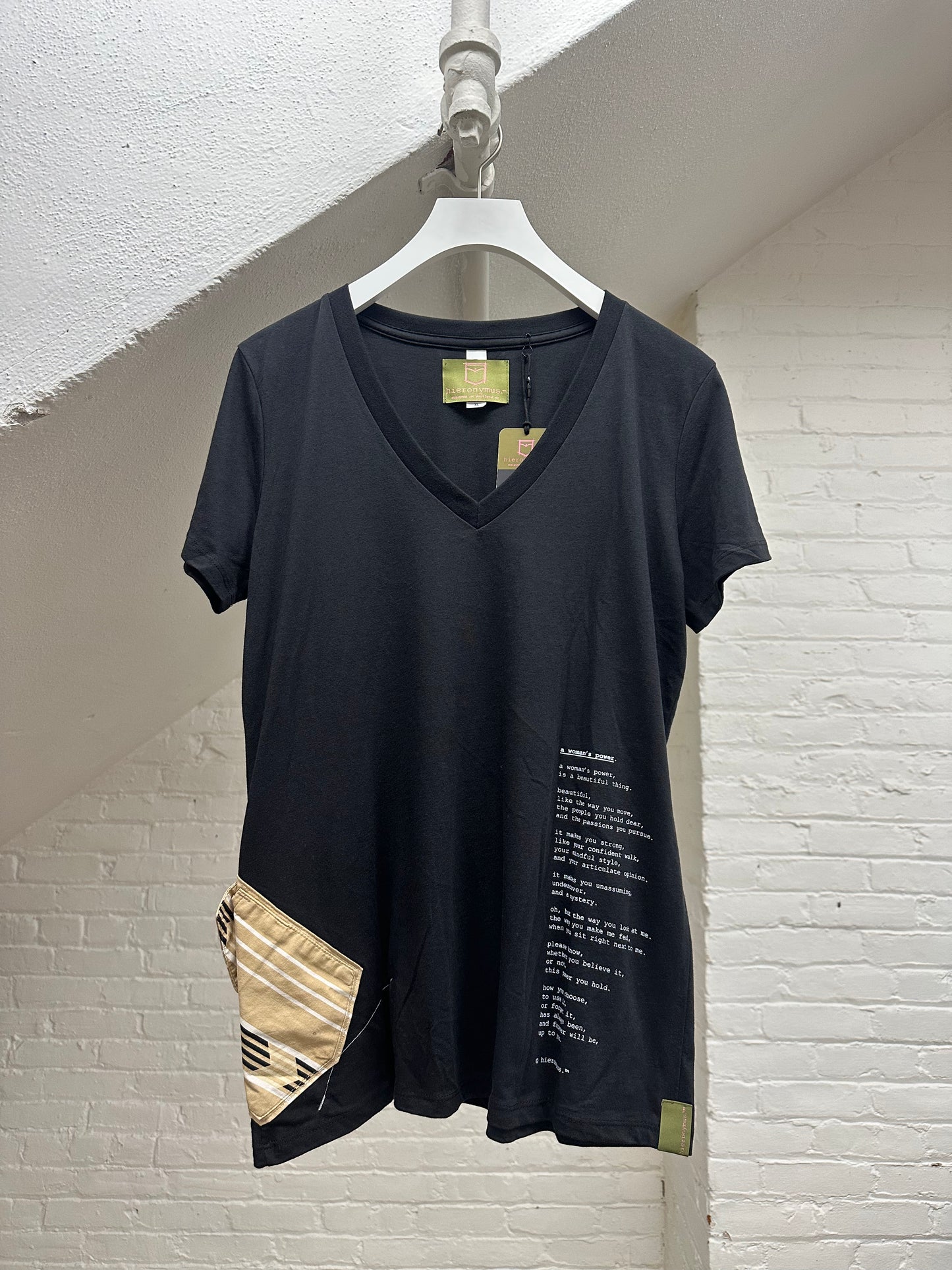 "a woman's power." - ps76R - sz women's XL. - v neck.
