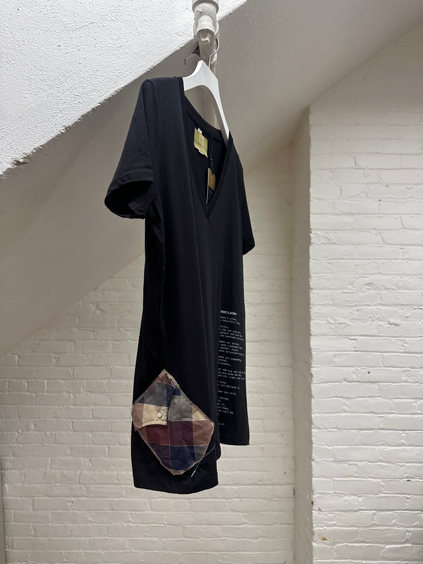 "a woman's power." - ps32R - sz women's 2XL. - v neck.